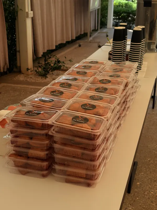 Stacked boxed meals with The Feastify stickers