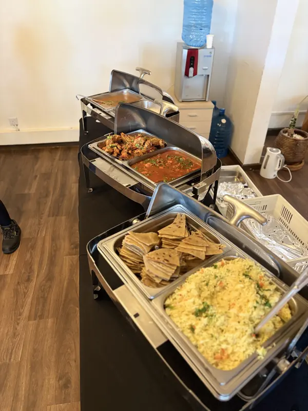 Hot dishes in chafing trays ready to serve