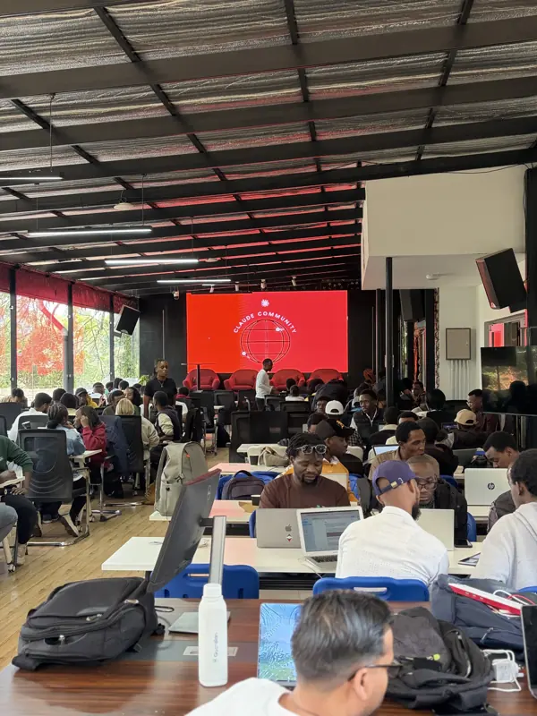 A full conference room at a corporate summit