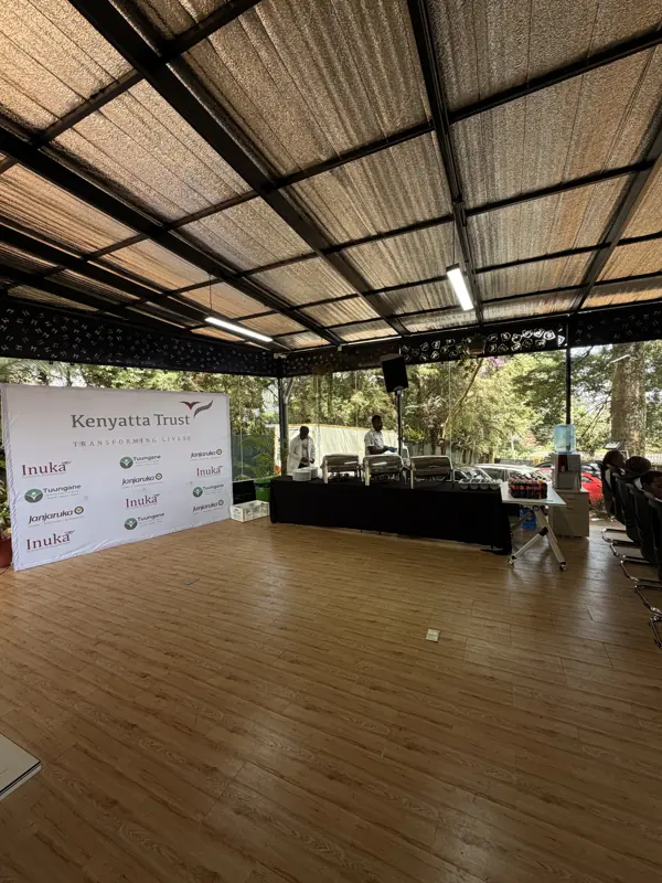 Buffet setup in front of a branded event backdrop