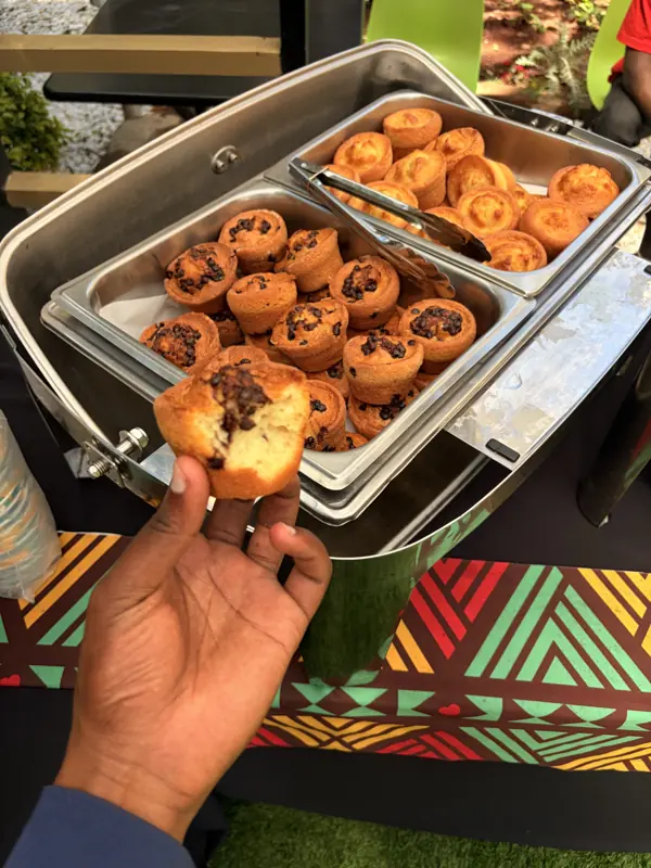 Freshly baked muffins in a chafing dish at a tea break